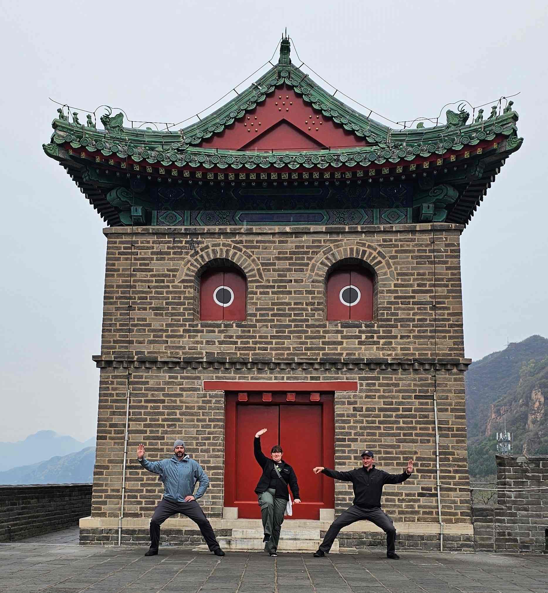 Posing before the face of the Great Wall